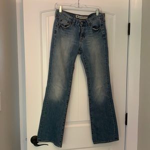 Low rise boot cut medium wash jeans